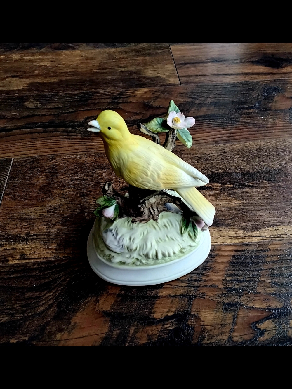 Gorham Yellow Porcelain Musical Canary Figurine. Plays "Somewhere My Love"